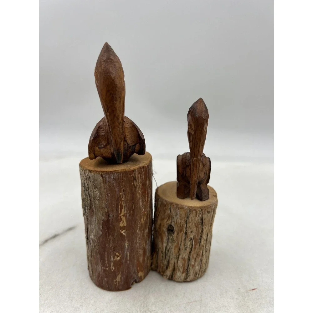 Hand Carved Wood Pelican Pair Figurines on Log Bases Rustic Coastal Folk Art